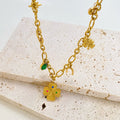 Titanium Steel Necklace Female Ginkgo Leaf Letters Emerald Zircon - Norellé